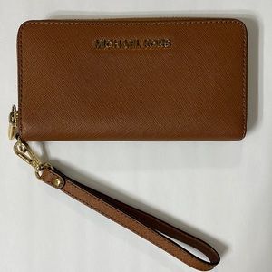 Brown Michael Kors wallet with wrist strap